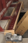 The consolidating screw conveyor
